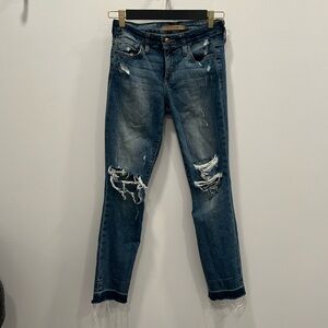Cute Medium Wash Joe’s Jeans with rip in knees and frayed bottom design